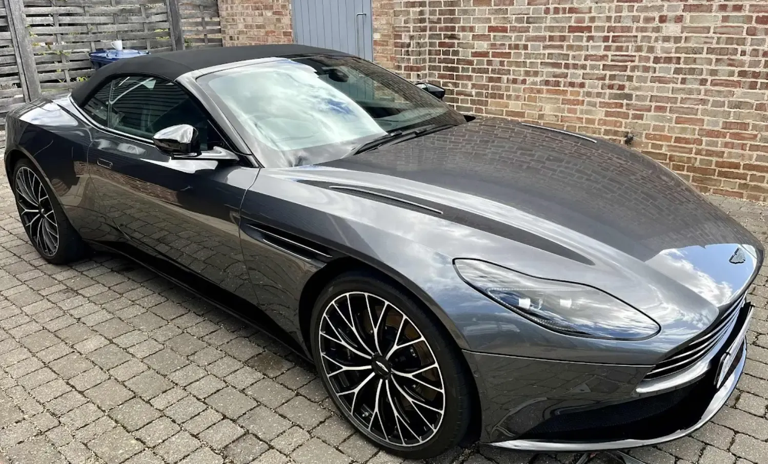 Freshly valeted Aston Martin DB11 Volante on a driveway